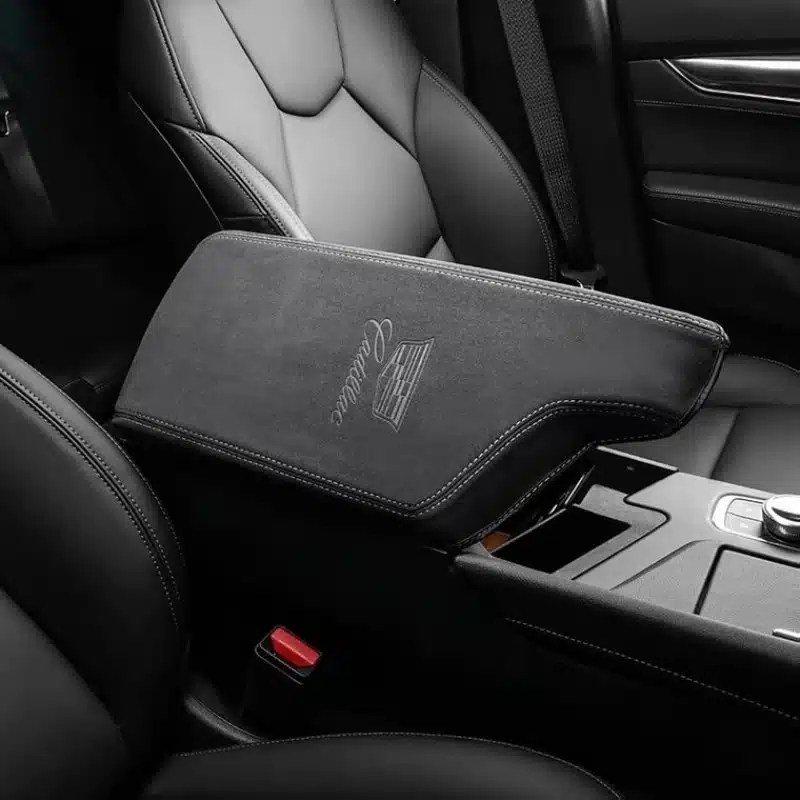 Cadillac Armrest Cover 1 Suede Cadillac armrest cover fitted to the centre console lid